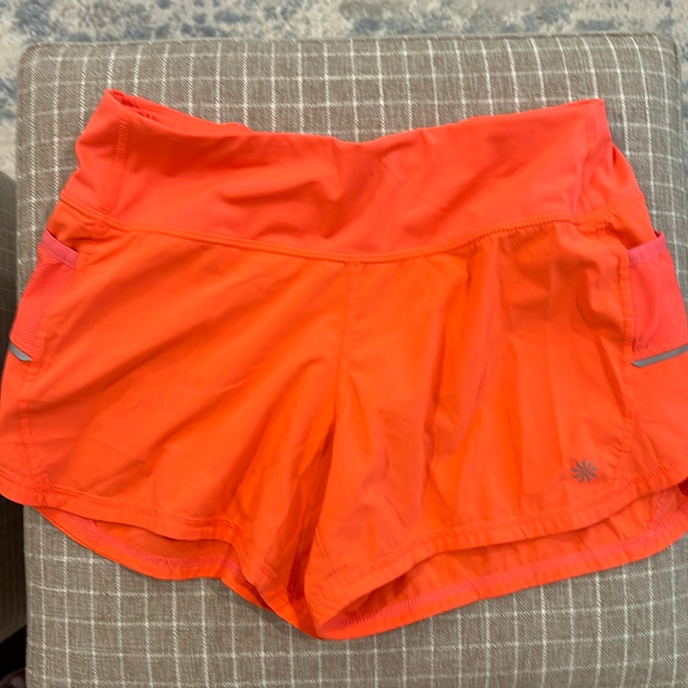 Neon, orange, athleta size small athletic shorts